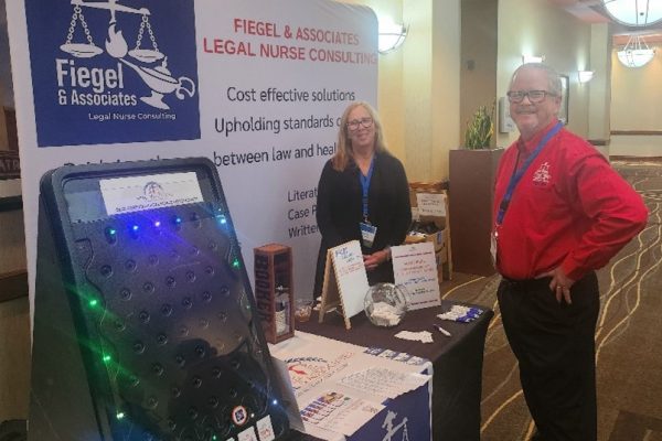 Fiegel & Associates showing off their exhibition booth at the Tennessee Bar Association Health Law Forum 2024.